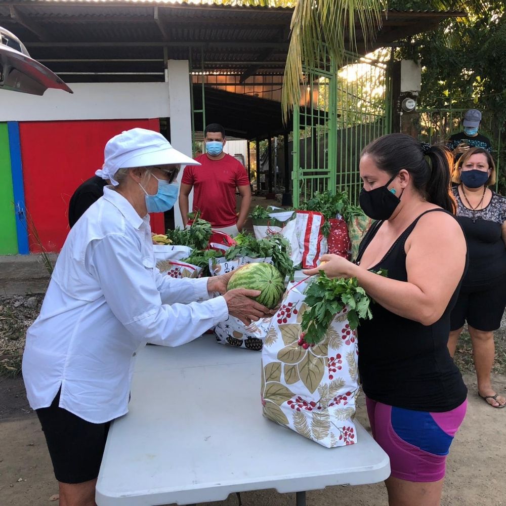 Trish donating food to families in need (1)